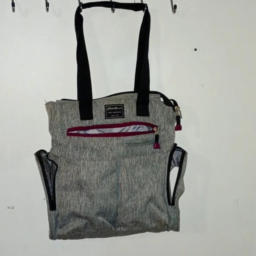 Eddie Bauer diaper bag with many compartment including insulated side pocket